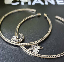 Load image into Gallery viewer, Chanel Crystal Moon Star CC Massive Hoop Earrings - LuxyBrand
